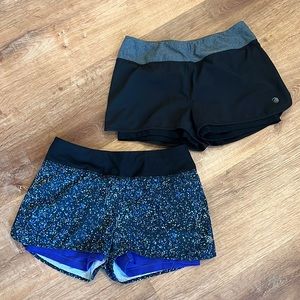 Two pairs of MPG athletic shorts with shorts lining. Like new. Size Small.